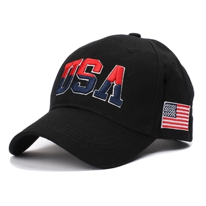 Black baseball cap featuring bold USA embroidery and American flag side patch detail
