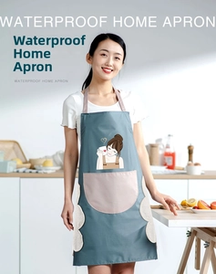 Close-up of waterproof apron with large front pocket and coral fleece hand-drying side panels
