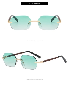 Detail of rimless octagonal sunglasses with green gradient lenses and wood grain temples