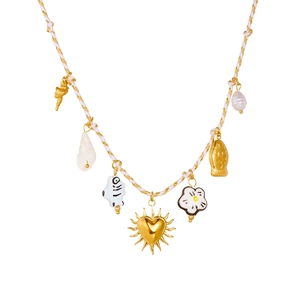 Bohemian woven rope necklace with colorful ceramic fish charms and golden sun heart