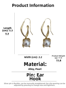 Detail view of pearl drop earrings showing dimensions of 5.3cm height and 2.2cm width