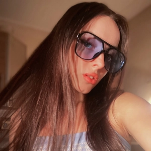 Retro oversized square sunglasses with black frame and light blue lenses for a hip-hop look