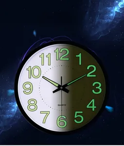 Luminous 12-inch quartz wall clock featuring glow-in-the-dark numerals against a starry night