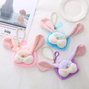 Plush bunny coin purses with pearl chains in pink, blue, and purple colors