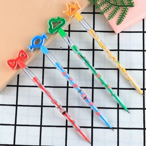Detail view of colorful non-sharpening pencils with fruit prints and decorative caps