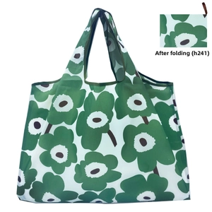 Detail of green floral folding shopping bag shown in both expanded and folded states