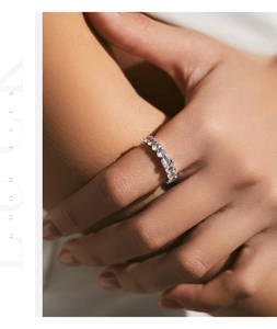 Macro detail of luxury s925 silver eternity ring with sparkling full pavé cubic zirconia