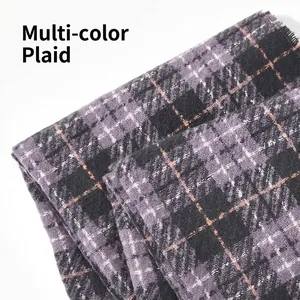 Purple and black plaid knit scarf with soft texture for winter warmth and layering