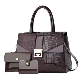 Three-piece women's handbag set in burgundy crocodile embossed glossy patent leather
