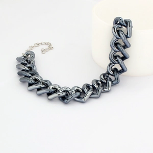 Close-up of gunmetal hip hop pet necklace with adjustable silver extension chain link