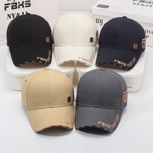 Baseball caps in five colors with gold letter embroidery and metal vent eyelets