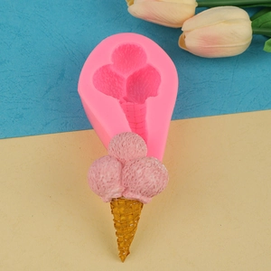 Pink silicone mold for creating ice cream cone shapes for creative cake decorations