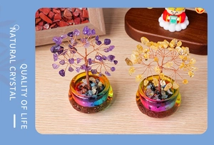 Detail of purple and yellow crystal money trees on natural crystal gravel bases