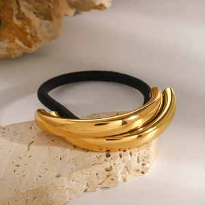 Minimalist gold stainless steel hair ring on stone display for high ponytail