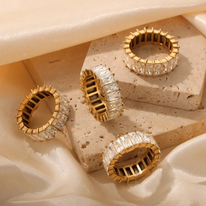 Elegant gold titanium steel eternity rings set with rectangular cubic zirconia stones