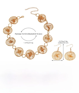 Macro detail of golden hollow geometric metal jewelry set showing dimensions and weights