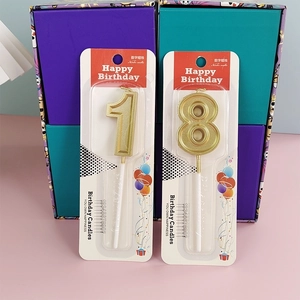 Golden number candles 1 and 8 for birthday cake decoration in elegant blister packaging