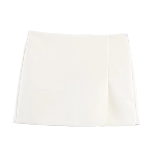 Minimalist white slit skort with woven texture shown on a clean white background