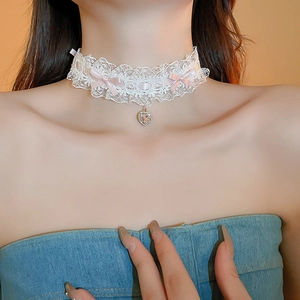 White lace choker featuring pink bows and a sparkling heart crystal pendant for women