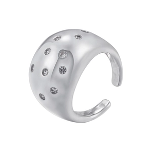 Macro detail of wide silver dome ring featuring multiple inlaid round cubic zirconia stones