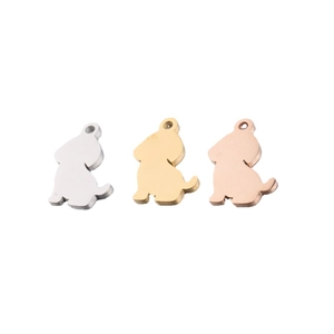 Three dog-shaped stainless steel pendants in silver, gold, and rose gold finishes