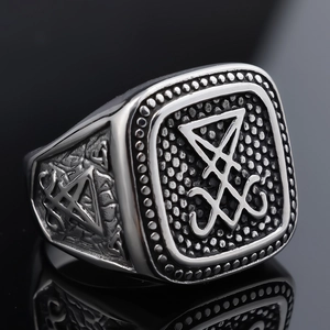 Silver stainless steel Sigil of Lucifer ring with gothic embossed texture on black background