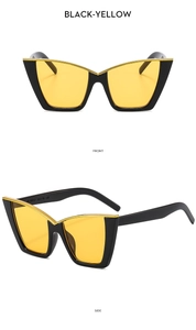 Close-up of black cat-eye sunglasses with yellow lenses and 51mm frame dimensions