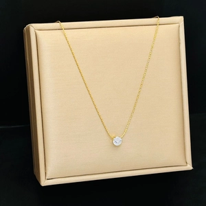 Elegant gold titanium steel necklace featuring a sparkling round cubic zirconia pendant