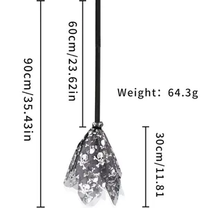 Detail of Halloween witch broom with skull mesh and dimensions of 90cm total length