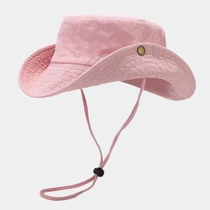 Detail of pink cotton sun hat featuring adjustable windproof drawstring and metal side snaps