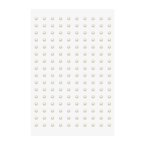 Macro detail of rows of white round adhesive pearls for DIY craft and car interior decor