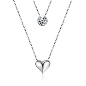 Double layered silver heart necklace with zircon pendant on clean white background