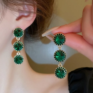 Boucles d'oreilles vintage dorées avec trois cristaux vert émeraude ronds alignés