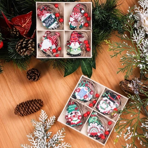 Detail of wooden Christmas gnome pendants set with rustic twine and decorative red beads