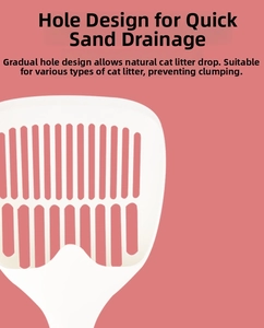 Detail view of the gradient sifting holes on this white plastic cat litter scoop tool