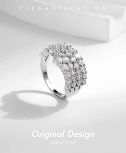 Macro shot of silver ring featuring four rows of sparkling pavé-set round cubic zirconia