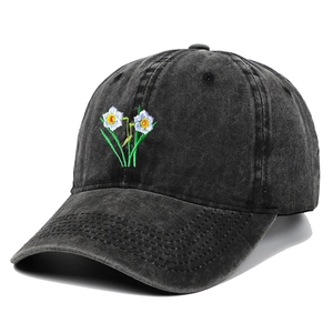 Vintage dark grey washed cotton baseball cap featuring floral embroidery and curved brim