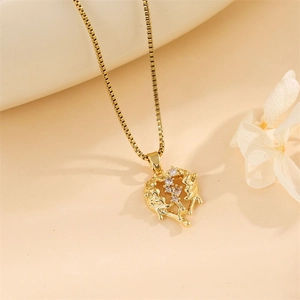 Gold heart angel wing pendant necklace with cubic zirconia on elegant box chain