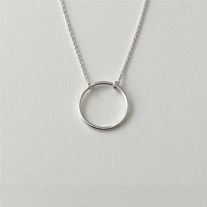 Minimalist S925 sterling silver necklace featuring a geometric circular ring pendant