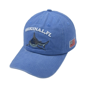 Vintage washed blue cotton baseball cap with shark embroidery and US flag patch