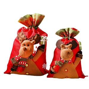 Christmas reindeer burlap gift bags in two sizes with festive snowflake patterns and drawstrings