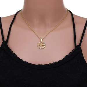 Macro shot of gold MOM heart pendant with colorful zircon stones on a stainless steel chain