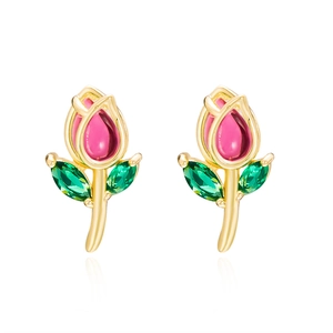 Close-up of golden tulip stud earrings with pink enamel flowers and green gem leaves