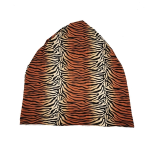 Detailed view of the soft tiger stripe knit texture on this vintage versatile beanie hat