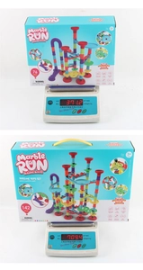 Weight comparison of 76 and 142 piece marble run building blocks on electronic scale