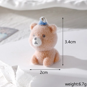 Brown flocked teddy bear charm with blue party hat and metal loop 3.4cm height
