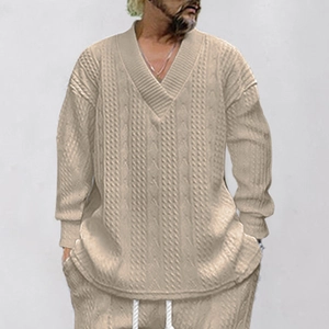 Detailed macro texture of beige cable knit fabric and V-neckline on men sweater