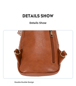 Detail of brown PU leather bag showing double buckle design and vintage metal D-rings