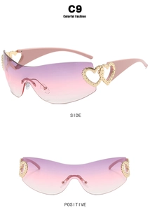 Y2K rimless sunglasses with gradient purple lenses and gold heart metal accents