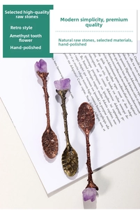 Macro detail of vintage copper spoons with natural amethyst clusters and floral carvings